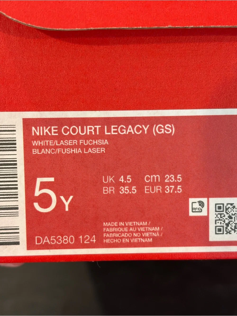 Nike White Sneakers with Pink Swoosh and Accent Stripe